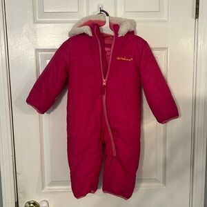 Pink snow one piece snow suit with hood.